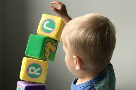 little boy with blocks